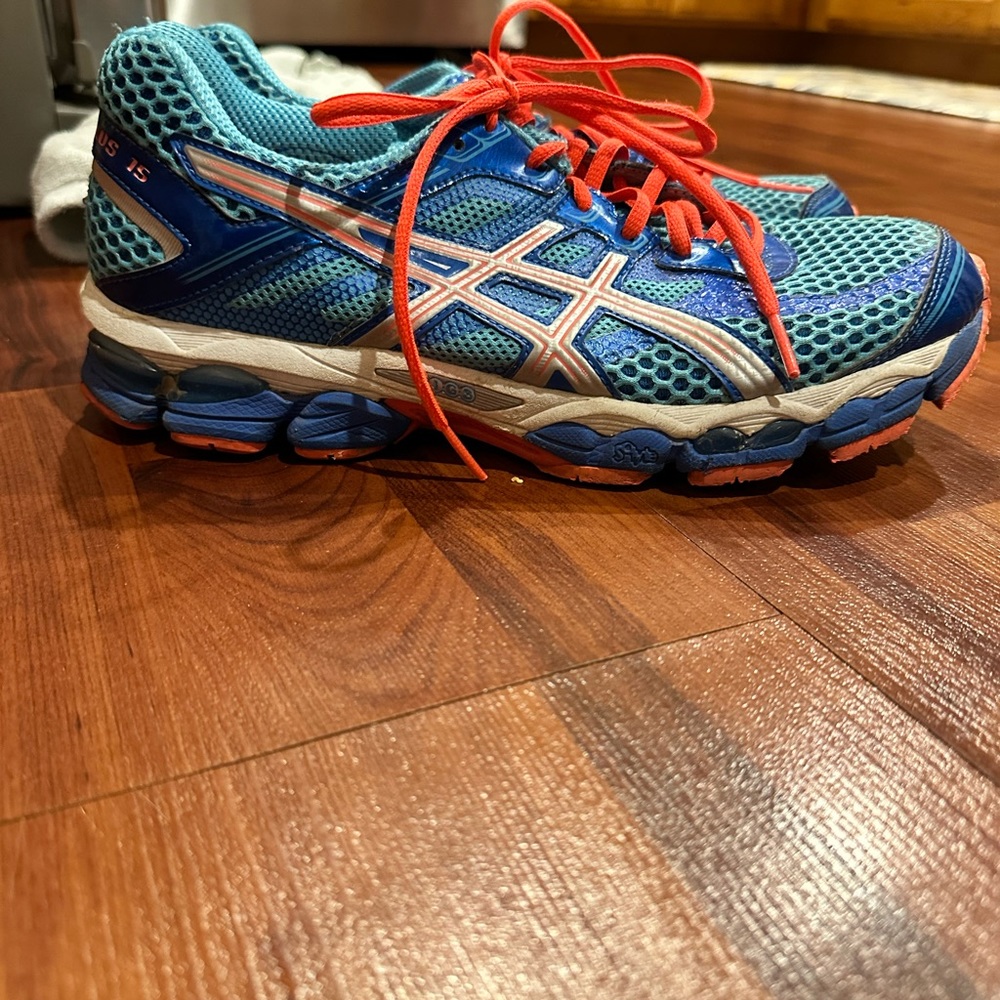 ASICS women’s tennis shoes.